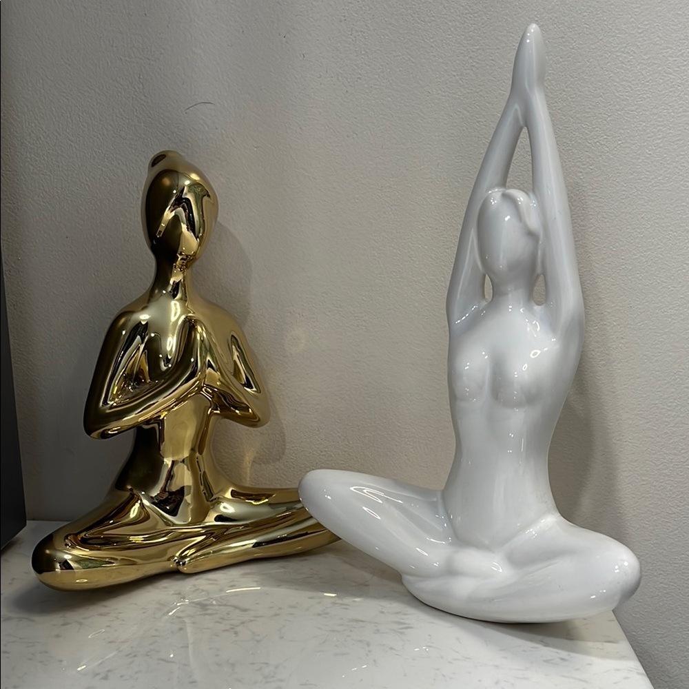 Gold and White Yoga Figurines